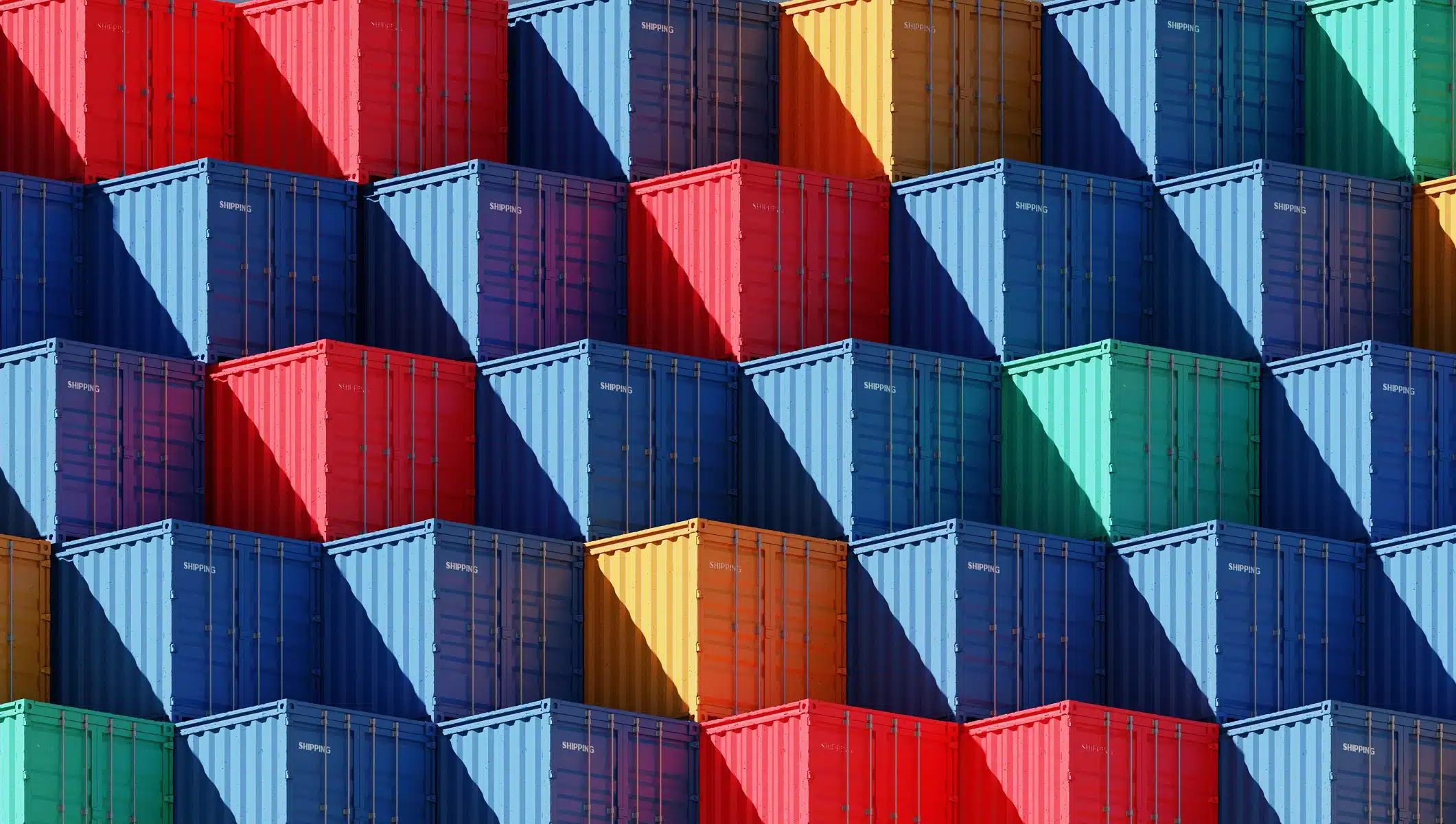 Stacked shipping containers in red, blue, yellow, and green with diagonal shadows